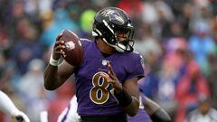 BALTIMORE, MARYLAND - OCTOBER 02: Quarterback Lamar Jackson #8 of the Baltimore Ravens fakes a handoff against the Buffalo Bills at M&T Bank Stadium on October 02, 2022 in Baltimore, Maryland.   Rob Carr/Getty Images/AFP