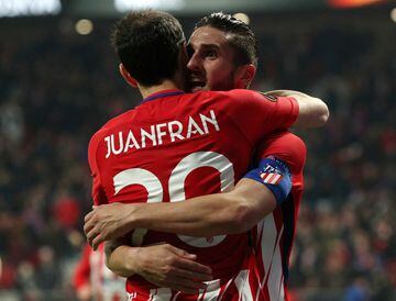 Koke celebrates with Juanfran after scoring their third goal  