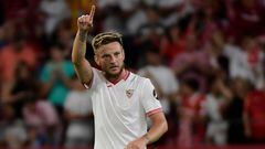 Sevilla's Croatian midfielder #10 Ivan Rakitic celebrates scoring his team's second goal that was later annulled during the Spanish Liga football match between Sevilla FC and Girona FC at the Ramon Sanchez Pizjuan stadium in Seville on August 26, 2023. (Photo by CRISTINA QUICLER / AFP)