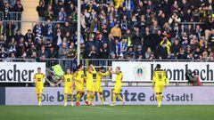 BIELEFELD, GERMANY - OCTOBER 23: Jude Bellingham celebrates with teammates Erling Haaland, Marco Reus and Mats Hummels of Borussia Dortmund after scoring their team&#039;s third goal during the Bundesliga match between DSC Arminia Bielefeld and Borussia D