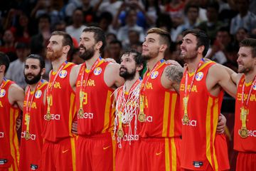 The Spain side receive their winners' medals.