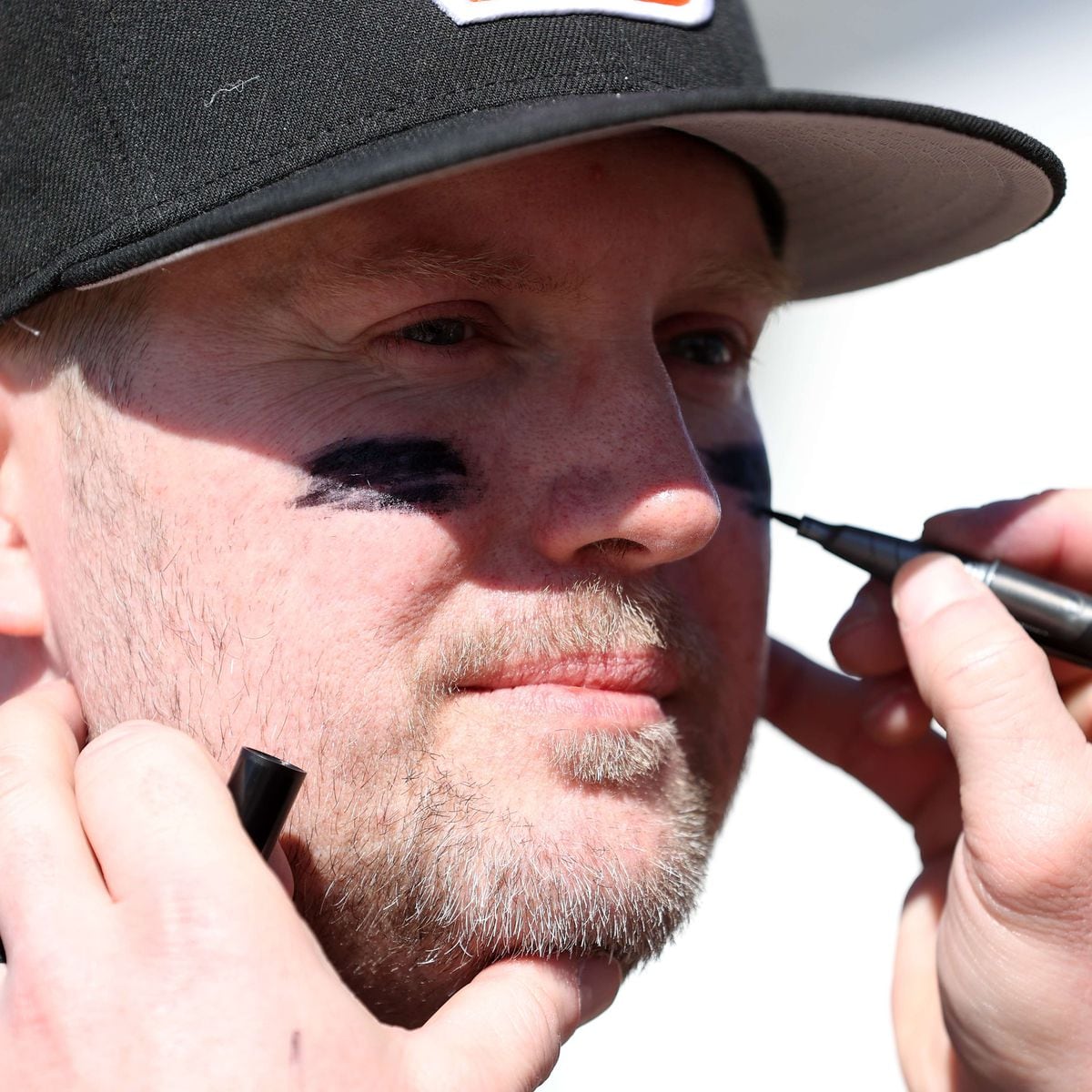 Close Up Of Little League Baseball Players Face Showing Eye Black
