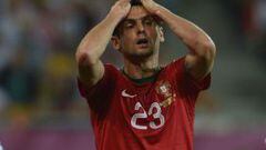 Portuguese forward Helder Postiga (C) reacts after missing a chance to score during  the Euro 2012 championships football match Germany vs Portugal  on June 9, 2012 at the Arena Lviv. AFP PHOTO / PATRIK STOLLARZ