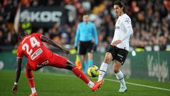 VALENCIA, SPAIN - JANUARY 23: Edinson Cavani of Valencia CF is challenged by Houboulang Mendes of UD Almeria during the LaLiga Santander match between Valencia CF and UD Almeria at Estadio Mestalla on January 23, 2023 in Valencia, Spain. (Photo by Aitor Alcalde/Getty Images)