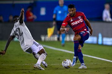 LAFC midfielder Mendez defends against FC Dallas forward Jara 