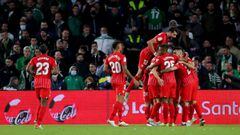 SEVILLE, SPAIN - NOVEMBER 07: Players of Sevilla FC celebrate their team&#039;s second goal, an own goal scored by Hector Bellerin of Real Betis (not pictured) during the La Liga Santander match between Real Betis and Sevilla FC at Estadio Benito Villamar