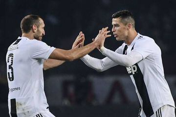 Cristiano Ronaldo celebrates with Juventus' Italian defender Giorgio Chiellini after opening the scoring during the Italian Serie A football match Torino