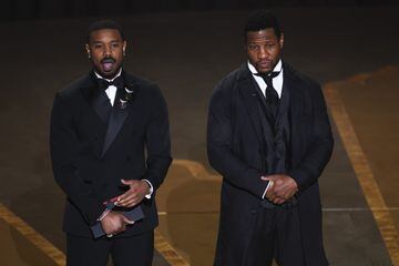 Jonathan Majors and Michael B. Jordan present the Oscar for Best Cinematography during the Oscars show at the 95th Academy Awards in Hollywood, Los Angeles, California, U.S., March 12, 2023. REUTERS/Carlos Barria