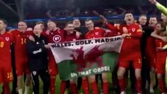 Real Madrid: Bale celebrates with "Wales. Golf. Madrid" flag