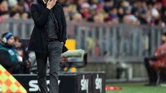 Pep Guardiola observes his side losing to FSV Mainz 05 in Munich. 
