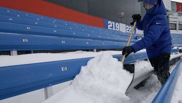 Dec 10, 2017; Orchard Park, NY, USA; Stadium personnel shovels off seats at New Era Field before a game between the Buffalo Bills and the Indianapolis Colts. Mandatory Credit: Timothy T. Ludwig-USA TODAY Sports
