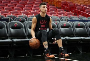 Tyler Herro looks on during warm-up prior to the Miami Heat's preseason game against the Charlotte Hornets.