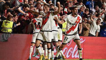 MADRID, SPAIN - OCTOBER 03: Fran Garcia (L) and Jose Pozo of of Raya Vallecano celebrate after Unai Lopez scored their team's second goal during the LaLiga Santander match between Rayo Vallecano and Elche CF at Campo de Futbol de Vallecas on October 03, 2022 in Madrid, Spain. (Photo by Denis Doyle/Getty Images)