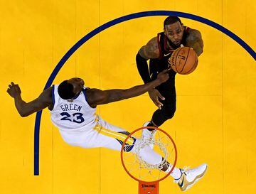 May 31, 2018; Oakland, CA, USA; Cleveland Cavaliers forward LeBron James (23) shoots the ball against Golden State Warriors forward Draymond Green (23) in game one of the 2018 NBA Finals at Oracle Arena. Mandatory Credit: Kyle Terada-USA TODAY Sports     