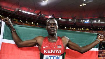 (FILES) In this file photo taken on August 25, 2015 Kenya&#039;s Nicholas Bett celebrates winning the final of the men&#039;s 400 metres hurdles athletics event at the 2015 IAAF World Championships at the &quot;Bird&#039;s Nest&quot; National Stadium in B