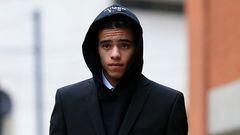 England and Manchester United footballer Mason Greenwood leaves Minshull Street Crown Court in Manchester on November 21, 2022 after a preliminary hearing on charges of attempted rape, controlling and coercive behaviour, and assault. - The 21-year-old was first arrested in January over allegations relating to a young woman after images and videos were posted online. All three charges relate to the same complainant. (Photo by Lindsey Parnaby / AFP)