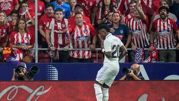 FILE - Real Madrid's Rodrygo, left, celebrates after scoring with his teammate Real Madrid's Vinicius Junior the opening goal during the Spanish La Liga soccer match between Atletico Madrid and Real Madrid at the Wanda Metropolitano stadium in Madrid, Spain, Sept. 18, 2022. With a goal and a dance, Real Madrid's young Brazilian forwards made a strong statement against racism in soccer this weekend. With their samba-like moves after a goal in the derby against Atletico on Sunday, Rodrygo and Vinícius Junior made it clear they are not backing down. (AP Photo/Manu Fernandez)