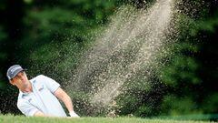 CROMWELL, CONNECTICUT - JUNE 24: J.T. Poston of the United States plays a shot from a bunker on the fourth hole during the second round of Travelers Championship at TPC River Highlands on June 24, 2022 in Cromwell, Connecticut. (Photo by Tim Nwachukwu/Getty Images)