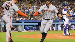 Sep 5, 2022; Los Angeles, California, USA;  San Francisco Giants third baseman J.D. Davis (7) is congratulated by third baseman Evan Longoria (10) after hitting a solo home run in the second inning against the Los Angeles Dodgers at Dodger Stadium. Mandatory Credit: Jayne Kamin-Oncea-USA TODAY Sports