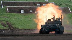 A Japan Ground Self-Defense Force (JGSDF) Type 10 battle tank fires ammunition during a live fire exercise at East Fuji Maneuver Area, in Gotemba, Shizuoka, Japan, May 28, 2022. Tomohiro Ohsumi/Pool via REUTERS
