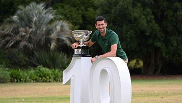 Serbia's Novak Djokovic poses with the Norman Brookes Challenge Cup trophy in Melbourne on January 30, 2023, after winning the Australian Open tennis tournament's mens' singles final against Greece's Stefanos Tsitsipas.