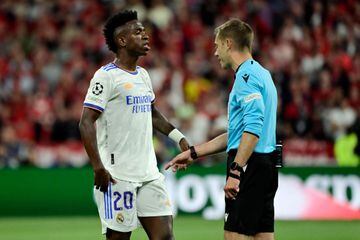 French referee Clement Turpin reacts has words with Real Madrid's Brazilian forward Vinicius Junior