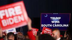A screen displays "Trump wins South Carolina" during Republican presidential candidate and former U.S. President Donald Trump's South Carolina Republican presidential primary election night party, in Columbia, South Carolina, U.S. February 24, 2024. REUTERS/Shannon Stapleton