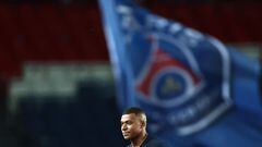 (FILES) Paris Saint-Germain's French forward Kylian Mbappe is seen at the end of the French L1 football match between Paris Saint-Germain (PSG) and Ajaccio at the Parc des Princes in Paris, on May 13, 2023. French champions Paris Saint-Germain have left Kylian Mbappe out of their squad for a pre-season tour of Japan, casting further doubt on the star striker's future. Mbappe declared in May 2023 that he would not extend his PSG contract, which expires next year, but indicated he wanted to remain at the club for a final season. (Photo by Anne-Christine POUJOULAT / AFP)