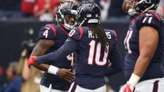 Oct 1, 2017; Houston, TX, USA; 
 Houston Texans quarterback Deshaun Watson (4) celebrates a touchdown with wide receiver DeAndre Hopkins (10) during the first quarter against the Tennessee Titans at NRG Stadium. Mandatory Credit: Shanna Lockwood-USA TODAY Sports
