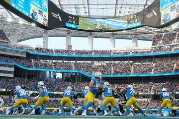Jan 2, 2022; Inglewood, California, USA; A general overall view as Los Angeles Chargers quarterback Justin Herbert (10) throws the ball in the second half against the Denver Broncos at SoFi Stadium. Mandatory Credit: Kirby Lee-USA TODAY Sports