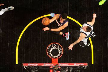 PHOENIX, AZ - MAY 2: Devin Booker #1 of the Phoenix Suns drives to the basket against the Dallas Mavericks