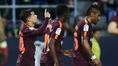 Philippe Coutinho of FC Barcelona celebrates after scoring his team&#039;s second goal during the La Liga match between Malaga and Barcelona at Estadio La Rosaleda on March 10, 2018 in Malaga, Spain.  