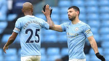 Manchester City&#039;s Argentinian striker Sergio Aguero (R) celebrates scoring their fifth goal during the English Premier League football match between Manchester City and Everton at the Etihad Stadium in Manchester, north west England, on May 23, 2021.