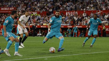 Soccer Football - LaLiga - Sevilla v Real Madrid - Ramon Sanchez Pizjuan, Seville, Spain - April 17, 2022 Real Madrid's Karim Benzema scores their third goal REUTERS/Marcelo Del Pozo