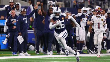 ARLINGTON, TEXAS - NOVEMBER 23: DaRon Bland #26 of the Dallas Cowboys returns an interception for a touchdown in the game against the Washington Commanders during the fourth quarter at AT&T Stadium on November 23, 2023 in Arlington, Texas.   Richard Rodriguez/Getty Images/AFP (Photo by Richard Rodriguez / GETTY IMAGES NORTH AMERICA / Getty Images via AFP)
