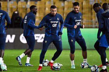 France's forward Kylian Mbappé takes part in a training session at the Agia Sophia Stadium in Athens.