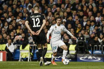 Marco Asensio runs at PSG defender Thomas Meunier after coming on in Wednesday's Champions League match.