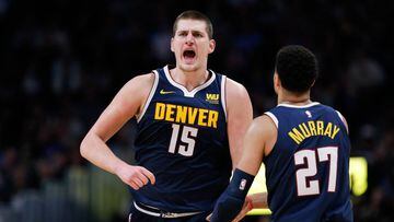 Jan 10, 2019; Denver, CO, USA; Denver Nuggets center Nikola Jokic (15) reacts with guard Jamal Murray (27) after a play in the third quarter against the Los Angeles Clippers at the Pepsi Center. Mandatory Credit: Isaiah J. Downing-USA TODAY Sports