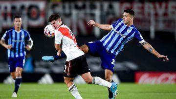 BUENOS AIRES, ARGENTINA - APRIL 24:  Julian Alvarez of River Plate fights for the ball with Ramiro Correa of Atletico Tucuman during a match between River Plate and Atletico Tucuman as part of Copa de la Liga 2022 at Estadio Monumental Antonio Vespucio Liberti on April 24, 2022 in Buenos Aires, Argentina. (Photo by Marcelo Endelli/Getty Images)