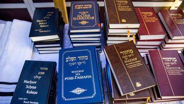 Rosh Hashanah prayer books in several languages are available at the entrance of the outdoor Synagogue in Berlin on September 18, 2020 amid the Covid-19 corona virus pandemic. - The Chabad Jewish Eduacation Centre in the German capital build a an outdoor 