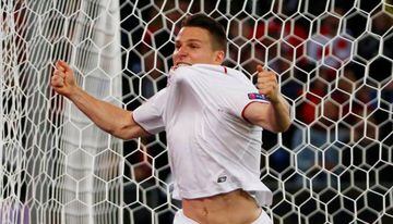 Kevin Gameiro celebrates after scoring the first goal that knocked the wind from Liverpool's sails and set Sevilla on their way.