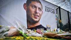 A picture shows flowers put in front of the entrance of the training center La Joneliere in La Chapelle-sur-Erdre on January 25, 2019, four days after the plane of Argentinian forward Emiliano Sala vanished during a flight from Nantes, western France, to 