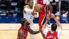 Feb 4, 2023; New Orleans, Louisiana, USA;  Los Angeles Lakers guard Russell Westbrook (0) passes the ball over New Orleans Pelicans forward Larry Nance Jr. (22) and forward Naji Marshall (8) during the second half at Smoothie King Center. Mandatory Credit: Stephen Lew-USA TODAY Sports