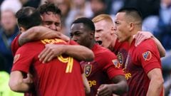 Bobby Wood of Real Salt Lake is congratulated by teammates after scoring in the final minute during the Major League Soccer Playoff game against Sporting Kansas City at Children&#039;s Mercy Park on November 28, 2021. 