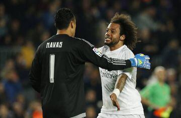 Navas celebrates with Marcelo after Real's El Clásico win.