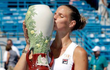 Karolina Pliskova of the Czech Republic kisses the winner's trophy after winning the final match against Angelique Kerber.