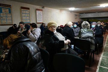 Women, children and senior citizens take refuge in an air raid shelter in Kyiv.