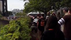 If it were a football instead of a beer can, you may have mistaken this Browns fan for the QB as he threw a beer can 40+ yards clear over a huge cargo ship.
