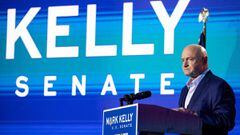 (FILES) In this file photo taken on November 3, 2020 Democratic US Senate candidate Mark Kelly speaks to supporters during the Election Night event at Hotel Congress in Tucson, Arizona. - Democratic US Senate candidate Mark Kelly wins in Arizona. (Photo b