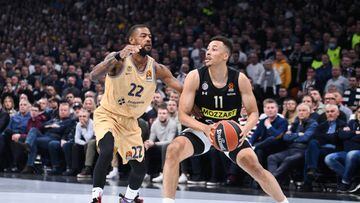 BELGRADE, SERBIA - MARCH 28: Dante Exum of Partizan Mozzart Bet Belgrade competes against Cory Higgins of FC Barcelona during the 2022/2023 Turkish Airlines EuroLeague match between Partizan Mozzart Bet Belgrade and FC Barcelona at Stark Arena on March 28, 2023 in Belgrade, Serbia. (Photo by Nikola Krstic/MB Media/Getty Images)